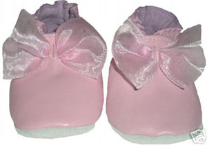 Our best seller. A soft pink leather with a pink organza bow